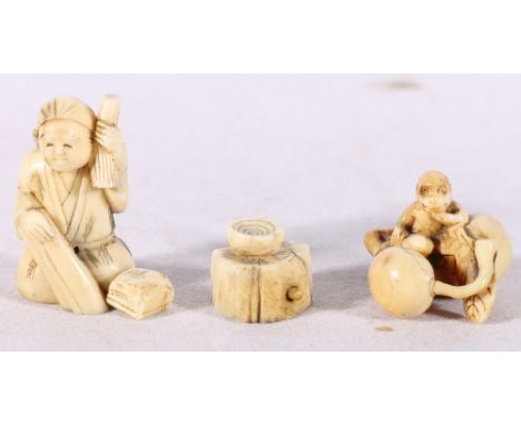 A late 19th Century ivory netsuke depicting a monkey on a gourd and another small Japanese ivory okimonoda street seller (2) 
