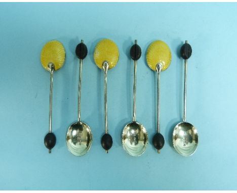 A George V silver set of six coffee bean Spoons, by William Suckling Ltd, hallmarked Birmingham, 1928, the bowls with yellow 