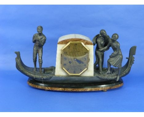 A French Art Deco marble and spelter 'Gondola' Mantel Clock by Sega, the clock with octagonal gilt dial in the centre of the 