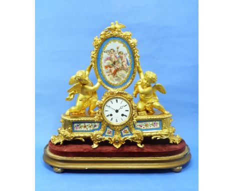 A 19thC French ormolu and porcelain Mantel Clock, by Miroy Frères, Paris, with a white enamel dial and Roman numerals, the si