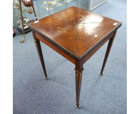 A pretty Edwardian inlaid mahogany envelope Card Table, 22in (56cm) wide.