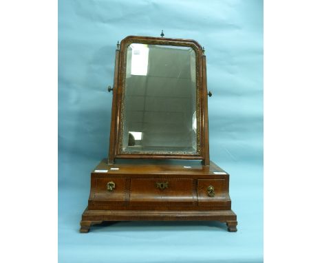 A 19thC inlaid Dressing-table Mirror, the mirror with cushion frame on a three drawer base.