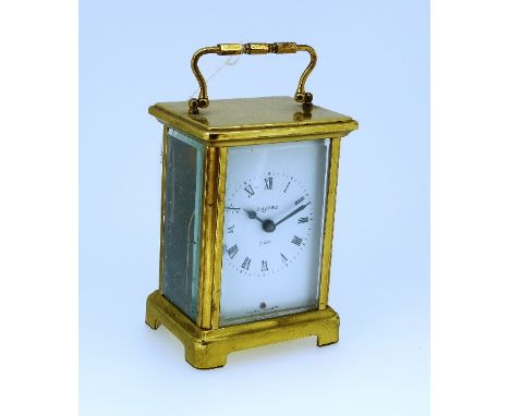 A French gilt brass Carriage Clock, of five-glass form, the brass dial with silvered chapter ring and Arabic numerals, 8-day 