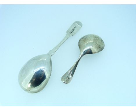 A Victorian silver fiddle pattern Caddy Spoon, hallmarked Chester, 1848, 5in (12.5cm) long, together with another silver cadd