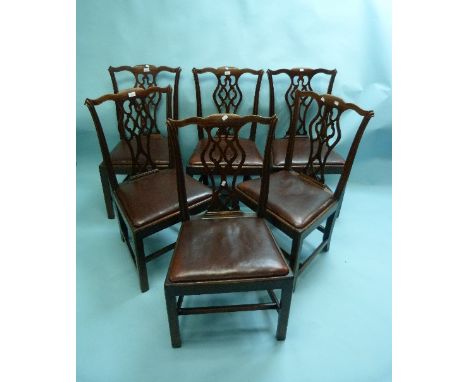 A set of six Georgian Chippendale style mahogany Dining Chairs, with pierced vase splat backs and leather upholstered drop in