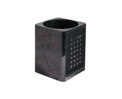 A SPINACH JADE BRUSH POT Square-form with cylindrical hollowed interior, two sides decorated in gentleman under a pine tree, 
