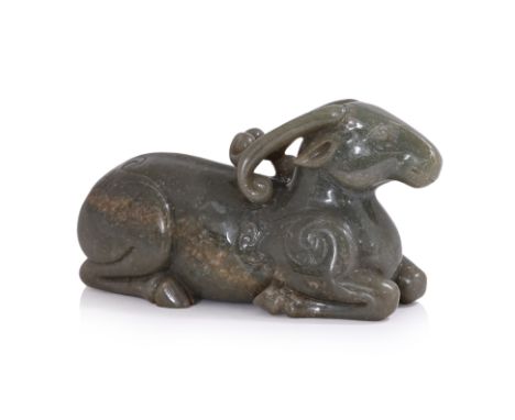A JADE MODEL OF A RECUMBENT RAM
Even-toned dark celadon jade, modelled as a seated ram with legs tucked under itself, stylise