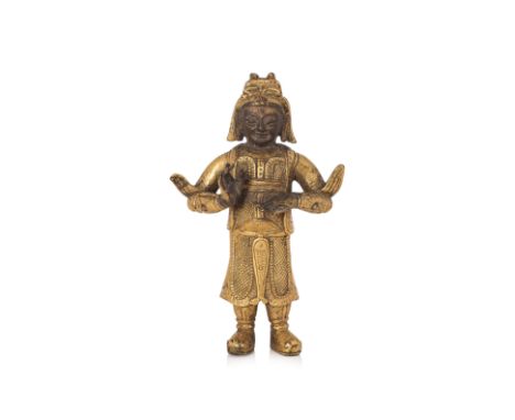 A GILT BRONZE FIGURE OF GUAN PING Modelled standing wearing armour, hands raised in gesture, hollow cast with chased features
