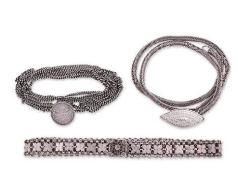A GROUP OF THREE SILVER BELTS
A long curb-link chain with Indian 1862 1 Rupee coin buckle; an example with snake-link chain a