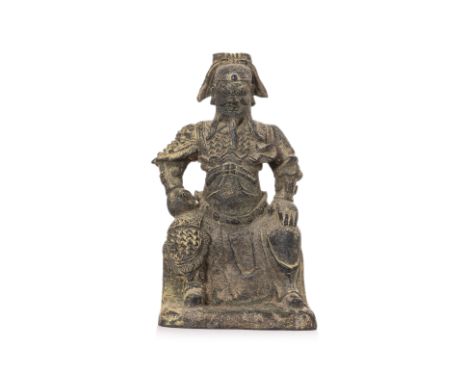 A SEATED BRONZE FIGURE OF GUANDI
Modelled wearing armour and futou headdress, hands at hips and clenched right fist, late Min