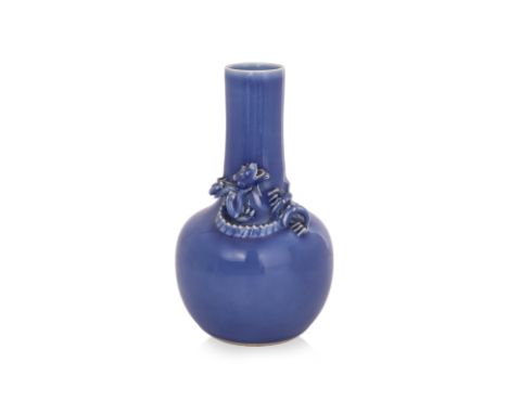 A MONOCHROME CLAIR-DE-LUNE DRAGON BOTTLE VASE
Globular body narrowing to the straight neck decorated with a sinuous coiled dr