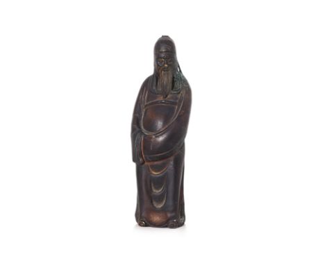 A STANDING BRONZE FIGURE OF A GUANDI
Modelled standing with hands held together under a flowing robe, wearing futou hat, prob