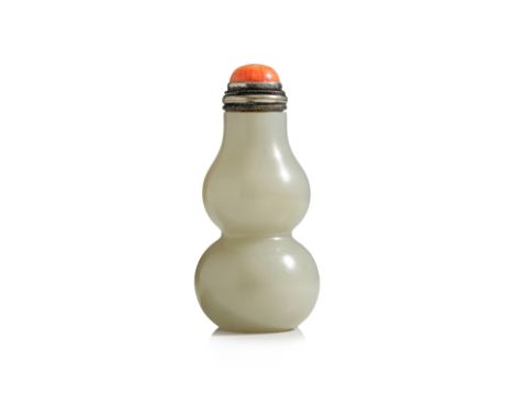 A DOUBLE-GOURD FORM CELADON JADE SNUFF BOTTLE
Even-toned pale celadon jade, of twin gourd form with rounded sides tapering at