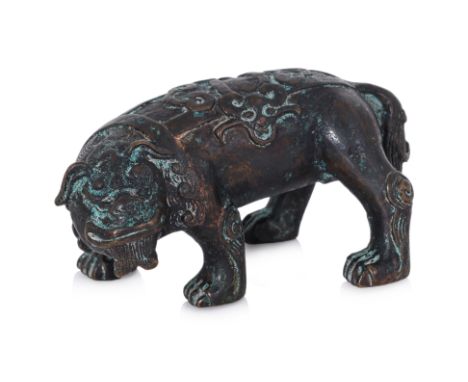 A BRONZE FIGURE OF A MYTHICAL BEAST
Hollow formed bronze modelled standing on all fours and facing to the side
10.5cm long
Fo