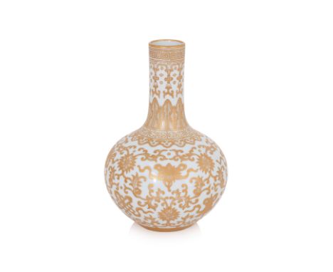 A SMALL GILT DECORATED PORCELAIN BOTTLE VASE
20th Century, rounded globular body tapering to and slender neck, white ground d