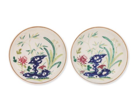 A PAIR OF FAMILLE ROSE PORCELAIN SAUCER DISHES Guangxu marks and believed of the period, decorated to the interior with bambo