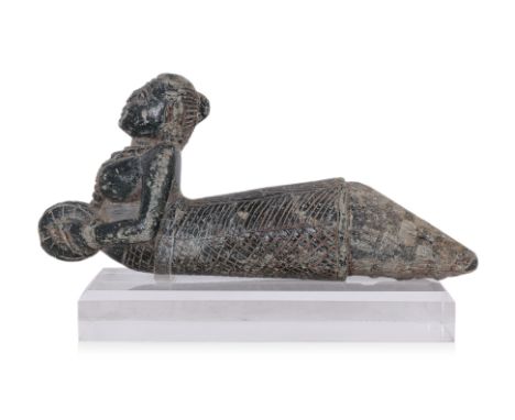AN INDIAN CARVED BLACK STONE TERMINAL OF A MUSICAL ASPARA
Probably 14th/15th century, black stone or basalt, conical form tem