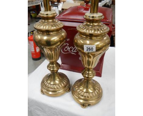 A pair of brass table lamp bases