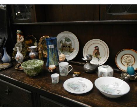 A collection of pottery, china and silver plate including Goebel monks, Nursery ware, baby rattle etc