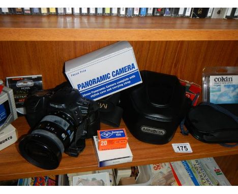 A Minolta camera, other camera's and accessories