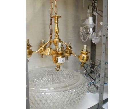 3 chandeliers and a ceiling light