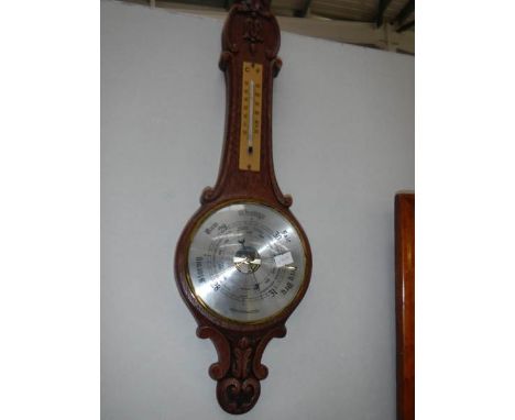 A Weather Master wall barometer