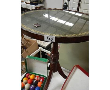 A tripod wine table