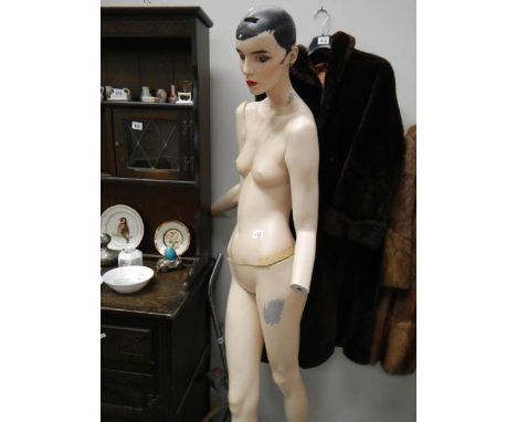 A shop mannequin, a.f