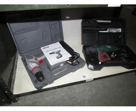 A cordless hammer drill and one other item