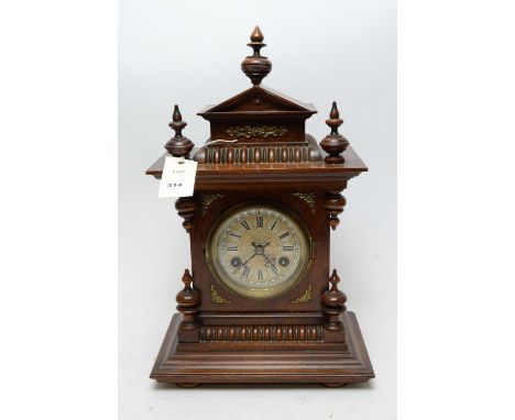 A Victorian mahogany mantel clock, in architectural case, 42cms high.