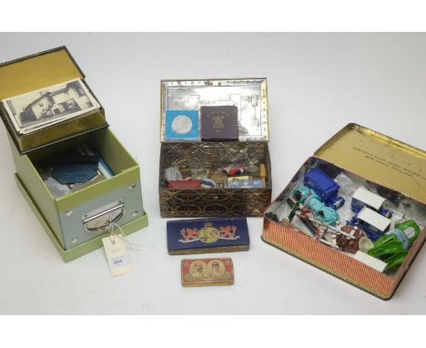 Selection of 20th century British coinage; along with other items including vintage postcards; Japanese tin plate clockwork m