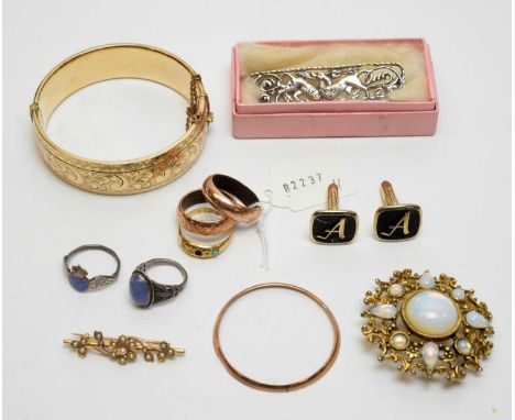 An 18ct. yellow gold ring set turquoise stone (missing others), 2.1grms; a seed pearl set yellow metal brooch, Edwardian, unm