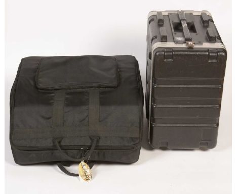 A 120 Bass Accordion soft case; and a SKB 19" amplifier flight case.