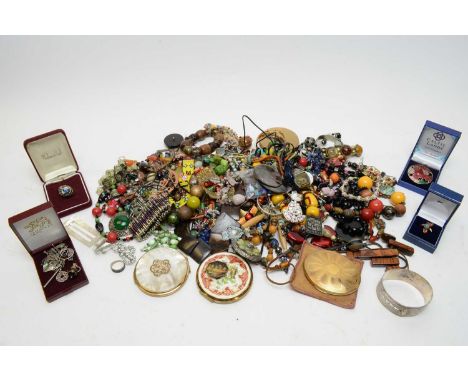 Collection of costume jewellery, including: Silver bangle; beads; bangles; brooches; marcasite set black enamelled gilt compa