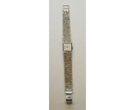 A 9ct white gold Omega cocktail watch, the manual wind movement no. 34084957, cal. 485, on textured strap, 21.3g gross (exclu