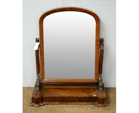 A Victorian mahogany toilet mirror, the central arched mercury plate contained within a mahogany moulded frame, enclosed by s