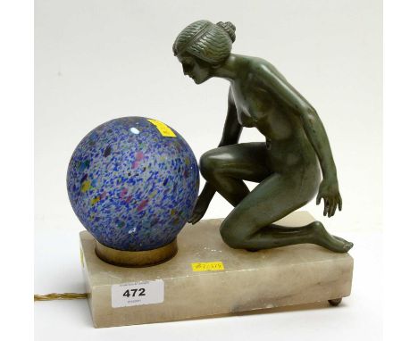 Art Deco figural table lamp, modelled with a kneeling nude lady gazing upon the globular mottled glass shade, on rectangular 