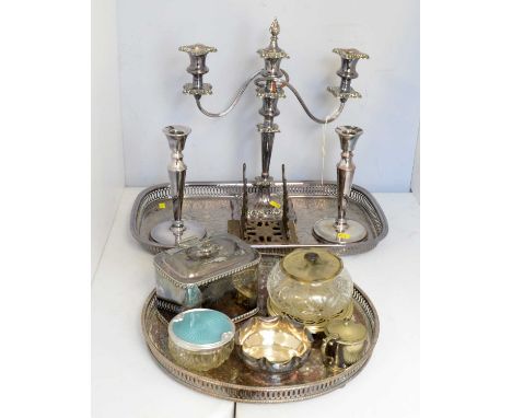A silver-plated two-branch candelabra, 41cms high; together with a selection of other silver-plated ware, including: a pair o