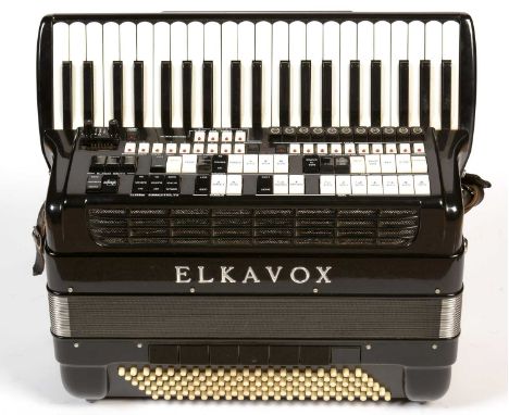 An Elkavox 120 Bass Electronic Piano Accordion, with multiple sound selectors, in black case, plush lined carry case.