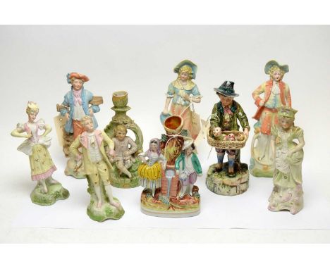 Staffordshire figural spill vase, 20cms high; along with a selection of seven various Staffordshire style figures and a candl