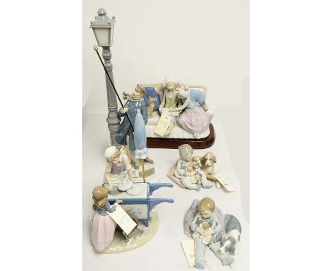 Lladro figure group of a child at icecream cart, 33cms high; along with four other Lladro figure groups including two modelle