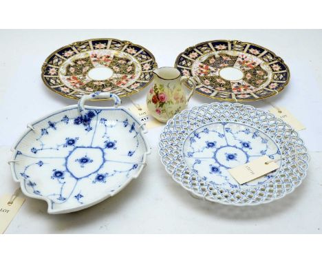 Two Royal Crown Derby Imari circular plates; along with a Royal Worcester jug painted with flowers and two Blue and White Cop