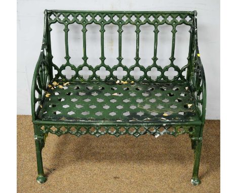 A late 19th/early 20th Century green painted cast iron garden bench, the rectangular top with pierced quatrefoil decoration, 