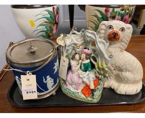 A Wedgwood 'Jasperware' biscuit barrel of cylindrical form, decorated with classical figures, approximately 15.5cms high; tog