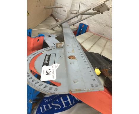 A sash clamp and an angle rule 