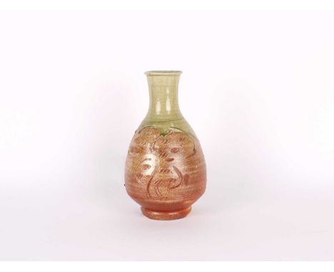 Phil Rogers (British 1951-2020) Tall Stoneware Bottle Vase Circa 2008, wood fired, the long neck in celadon glaze above ungla