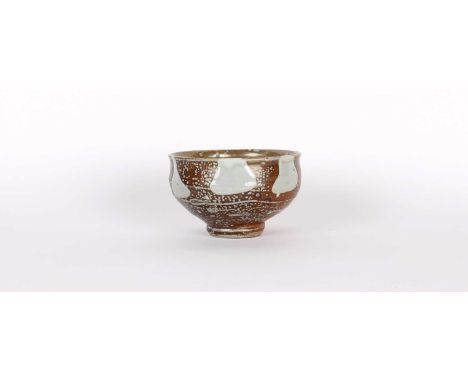 Phil Rogers (British 1951-2020) Stoneware Chawan Circa 2007-09, salt glazed with shino, impressed mark to footrim.13.5cm diam