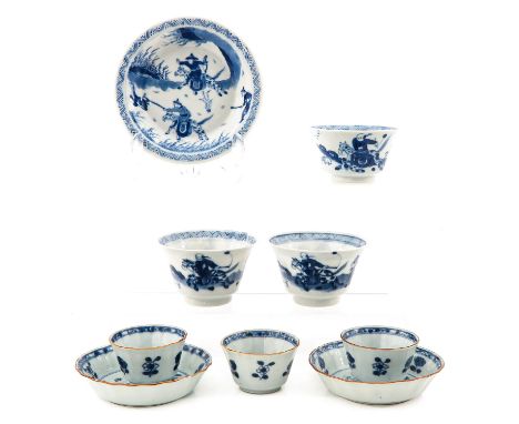 Including 6 cups and 3 saucers in a variety of blue and white decors, largest saucer is 14 cm. in diameter, chip and hairline