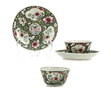 Floral decor, saucers are 11 cm. in diameter, chip and hairline.