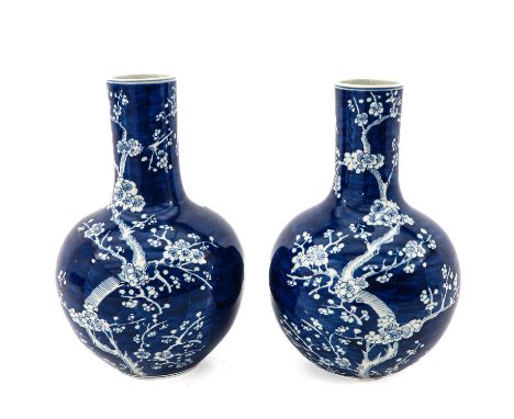 Dark blue ground decorated with white flower blossoms, marked with double ring 36 cm. tall. 
